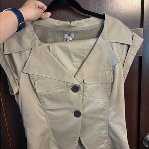 Beige Sleeveless Vest and skirt suit.